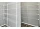 Walk-in closet featuring white shelving and providing ample space for clothing storage at 1221 Hamilton Dr, Greenwood, IN 46143