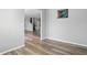 Entryway with sleek flooring leading into the kitchen and living areas featuring a solar system decor at 1221 Hamilton Dr, Greenwood, IN 46143