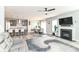 Spacious living room with a fireplace, hardwood floors, and an open-concept design at 1221 Hamilton Dr, Greenwood, IN 46143