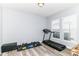 Workout room with a treadmill, bench, and free weights creating a convenient space for fitness activities at 1221 Hamilton Dr, Greenwood, IN 46143
