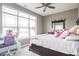 This bedroom features a large window and a desk area for studying at 1227 Highbury Dr, Danville, IN 46122