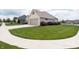 Well-maintained single-Gathering home featuring a brick exterior, two-car garage, and beautifully landscaped lawn at 1227 Highbury Dr, Danville, IN 46122