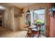 Inviting breakfast nook with sliding glass doors to outdoor brick patio area at 131 Olde Mill Bay, Indianapolis, IN 46260