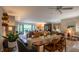 Open floor plan featuring a dining area that leads to the living room and outdoor views at 131 Olde Mill Bay, Indianapolis, IN 46260