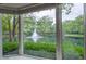 Beautiful water view from a bay window showing fountain, trees and lovely green space at 131 Olde Mill Bay, Indianapolis, IN 46260