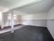 Large finished basement with neutral carpet and painted paneling at 1325 Countryside Ln, Indianapolis, IN 46231