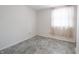 Bedroom with natural light, tile floors, and white walls at 1325 Countryside Ln, Indianapolis, IN 46231