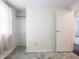 Bedroom with tile floors, closet and neutral walls at 1325 Countryside Ln, Indianapolis, IN 46231