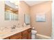 Bathroom featuring a marble countertop and ample lighting at 13807 Rue Fontaine Ln, McCordsville, IN 46055