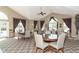 A well-lit dining area with multiple tables and seating, ideal for social gatherings at 13807 Rue Fontaine Ln, McCordsville, IN 46055