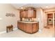 Convenient laundry room with ample cabinet space and granite countertops adjacent to the laundry area at 13807 Rue Fontaine Ln, McCordsville, IN 46055
