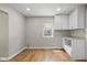 Bright dining area featuring natural light, built-in cabinets, and stylish granite countertops at 1382 S Morgantown Rd, Greenwood, IN 46143