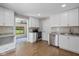 Modern kitchen featuring white cabinets, stainless steel appliances, and granite countertops at 1382 S Morgantown Rd, Greenwood, IN 46143