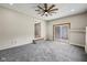 Spacious sun room with carpeted floors, recessed lighting, and easy access to the outdoors at 1382 S Morgantown Rd, Greenwood, IN 46143