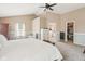 Bright main bedroom with a walk-in closet and an ensuite bathroom at 13861 Barberry Ct, Carmel, IN 46033