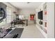 Well-lit home office with a desk, shelves, and workout equipment for convenient exercise at 13861 Barberry Ct, Carmel, IN 46033
