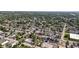 Expansive aerial view of a residential neighborhood with mature trees and well-maintained homes at 1405 Deloss St, Indianapolis, IN 46201