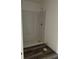 Unfinished bathroom features a full shower install and new vinyl flooring at 1441 Elm St, Martinsville, IN 46151