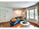 Inviting living room with hardwood floors and an abundance of natural light at 1548 N Park Ave, Indianapolis, IN 46202