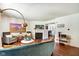 Bright living room with hardwood floors, fireplace, stylish furniture, and modern decor at 1548 N Park Ave, Indianapolis, IN 46202