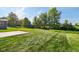 A large backyard and patio, perfect for entertaining outdoors at 1669 Windrush Pl, Westfield, IN 46074