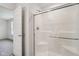 A bathroom with a shower showcasing sliding glass doors at 1669 Windrush Pl, Westfield, IN 46074