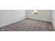 Bedroom featuring neutral carpet, white walls, and a window at 1669 Windrush Pl, Westfield, IN 46074