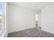 Bedroom featuring neutral carpet, white walls, and a closet at 1669 Windrush Pl, Westfield, IN 46074