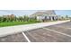 View of the community clubhouse with well-maintained landscaping and convenient parking at 1669 Windrush Pl, Westfield, IN 46074
