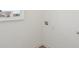 A laundry room features utility hookups, and a window at 1669 Windrush Pl, Westfield, IN 46074