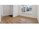 Bedroom with laminate floors, white walls and a window overlooking the neighborhood at 1694 Windrush Pl, Westfield, IN 46074