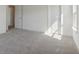 Carpeted bedroom with bright natural light at 1694 Windrush Pl, Westfield, IN 46074