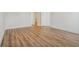 Spacious bedroom with durable wood-look floors, offering versatile space for relaxation and personalization at 1694 Windrush Pl, Westfield, IN 46074