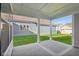 Covered patio with a concrete floor, providing a great outdoor space for relaxing and entertaining at 1694 Windrush Pl, Westfield, IN 46074