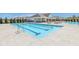 Community swimming pool with lane markers offers a refreshing and recreational amenity for residents at 1694 Windrush Pl, Westfield, IN 46074