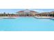 Stunning community pool area featuring a spacious pool, comfortable seating, and a covered pavilion at 1694 Windrush Pl, Westfield, IN 46074