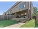 Inviting backyard with a spacious patio perfect for outdoor dining and entertainment space at 1818 N Pennsylvania St, Indianapolis, IN 46202
