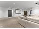 Large finished basement with projector screen, ample seating and plenty of room at 1818 N Pennsylvania St, Indianapolis, IN 46202