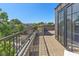 Charming outdoor deck overlooking neighborhood, featuring a sleek black railing and elegant glass-paneled doors at 1818 N Pennsylvania St, Indianapolis, IN 46202