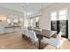 Elegantly designed dining room with modern lighting fixtures and stylish furnishings at 1818 N Pennsylvania St, Indianapolis, IN 46202