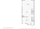 First floor plan showcasing the living room, kitchen, dining room, bathroom, and foyer at 1818 N Pennsylvania St, Indianapolis, IN 46202