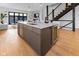 Modern kitchen with quartz countertops, island, and stainless steel appliances at 1818 N Pennsylvania St, Indianapolis, IN 46202