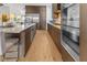 Well-equipped kitchen featuring a large island, stainless appliances, and modern cabinetry at 1818 N Pennsylvania St, Indianapolis, IN 46202
