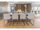 Modern kitchen with a center island, stainless steel appliances, and stylish pendant lighting at 1818 N Pennsylvania St, Indianapolis, IN 46202