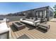 Stylish rooftop deck with comfortable seating arrangement and modern fire pit, perfect for urban relaxation at 1818 N Pennsylvania St, Indianapolis, IN 46202
