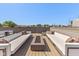 Inviting rooftop deck with comfortable seating and modern fire pit perfect for outdoor entertaining at 1818 N Pennsylvania St, Indianapolis, IN 46202