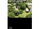 Expansive aerial view showing property featuring several outbuildings and mature trees at 18229 Moontown Rd, Noblesville, IN 46062