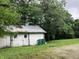 Exterior of a white barn with garbage cans at 18229 Moontown Rd, Noblesville, IN 46062