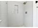 Bright bathroom features sleek subway tile and a modern shower head at 209 E John St, Alexandria, IN 46001