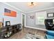Cozy bedroom with wood floors and neutral walls, perfect for relaxing at 209 E John St, Alexandria, IN 46001